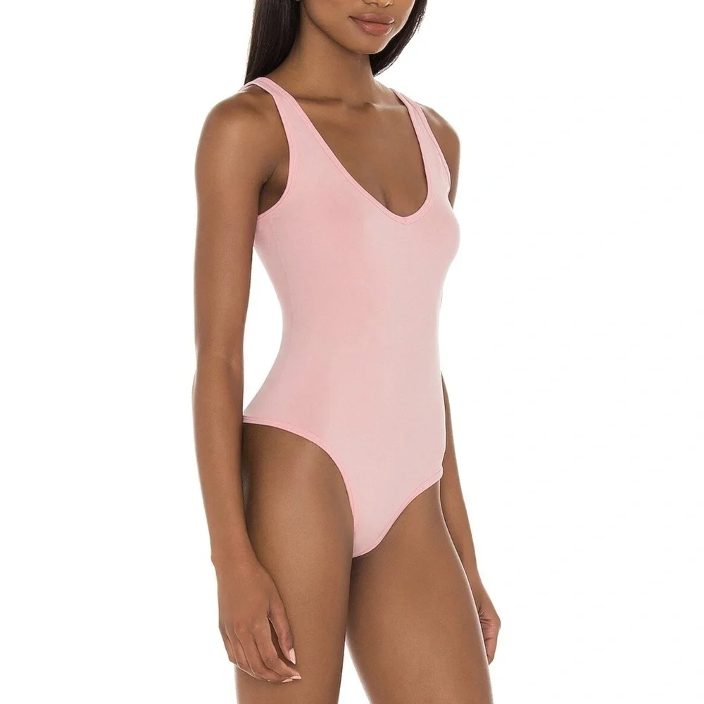 NWT Free People Washed Seamless Bodysuit in Washed Pink